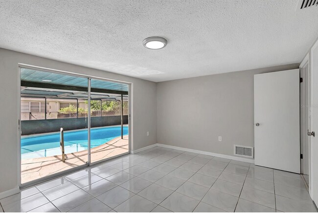 Building Photo - 7210 Parrot Dr