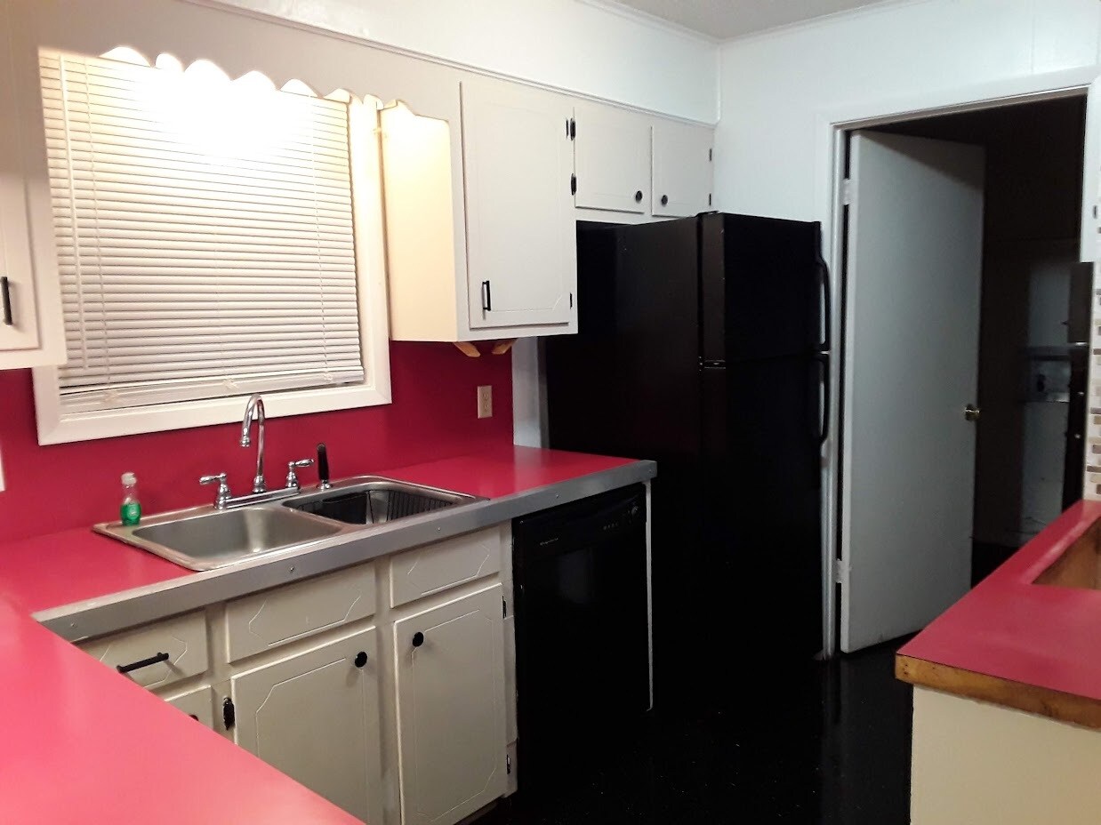 Kitchen and view to Laundry room - 206 W Charlotte Ave
