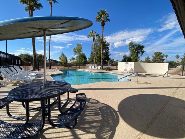 Building Photo - Quaint Retreat: 2BR/2BA Haven with Private Yard, Vaulted Ceilings & Cozy Fireplace