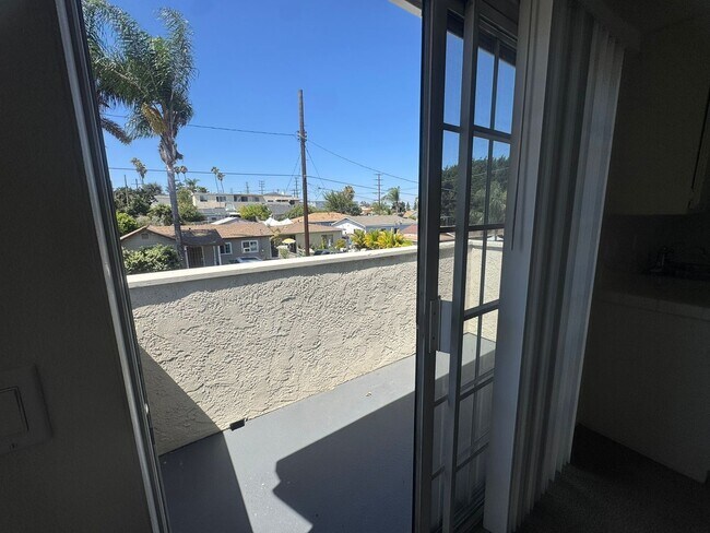 Building Photo - $2,395! Spacious Upstairs 2 Bedroom, 2 Bathroom Apartment with 2-Car Garage! 90710