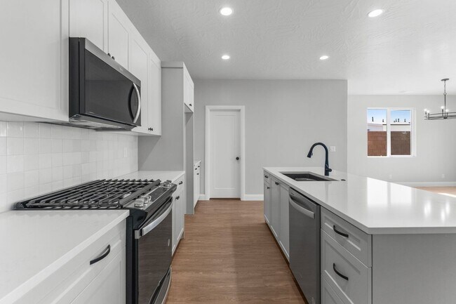 Building Photo - Modern New Construction with Designer Finishes & Open-Concept Living