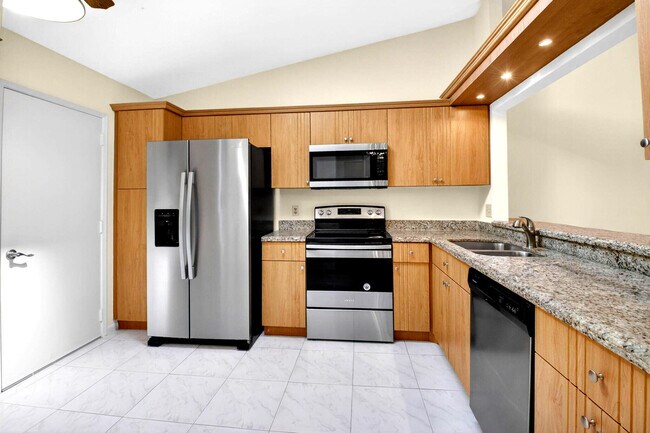 Building Photo - 10938 Roebelini Palm Ct