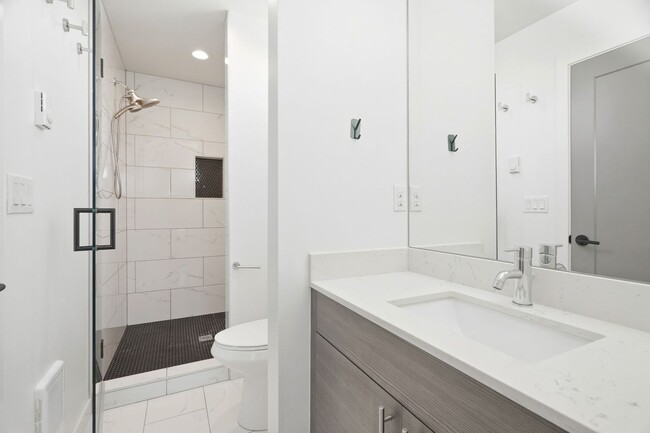 Building Photo - Modern 2 Bedroom with Rooftop Retreat and Garage