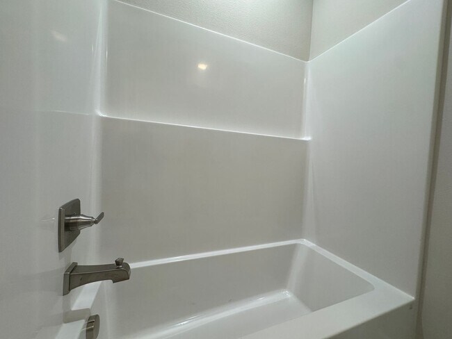 Building Photo - BRAND NEW - 4 bed - 3 bath - 2 car with fenced yard!