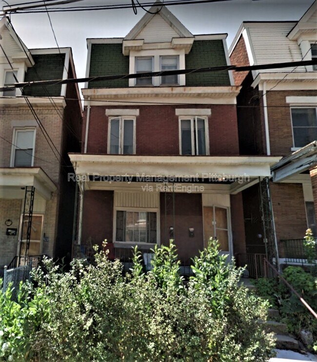 Building Photo - 825 Collins St