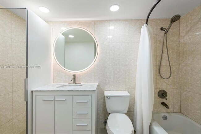 Building Photo - 19380 Collins Ave