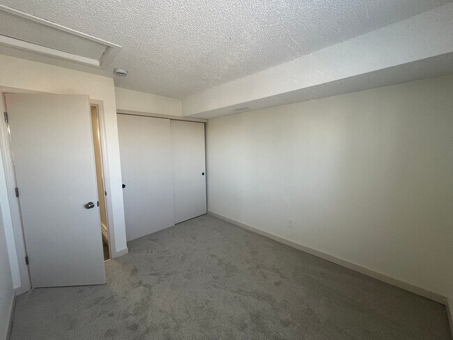 Building Photo - GORGEOUSLY REMODELED 2 bed 2 bath on 3rd floor with vaulted ceiling and skylight and in unit W/D!!