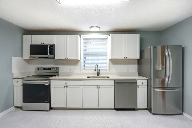 Building Photo - Renovated Single Family - Three Bedroom, Two Bathroom