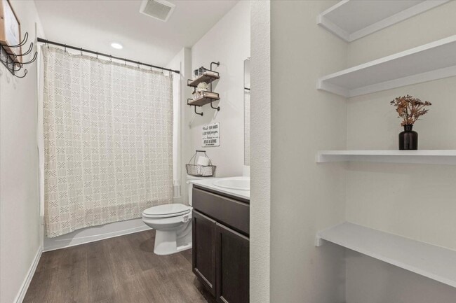 Building Photo - Modern single-story home with 4 bedrooms, 2 bathrooms, open-concept living, stylish kitchen, two-...