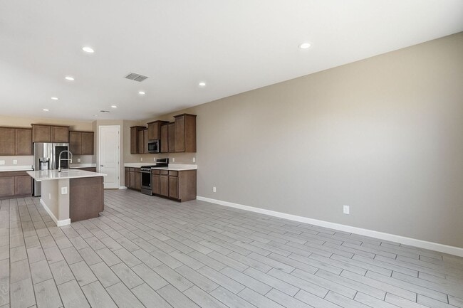 Building Photo - Spacious 5-Bedroom Home with Open Floor Plan & Private Backyard