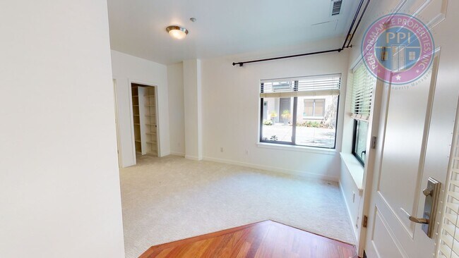 Building Photo - Riverfront Location, Luxury Townhome - End Corner Unit, Two En-Suites, Attached Garage