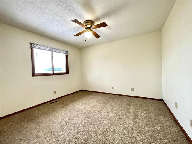 Building Photo - 6166 Upper 51st St N