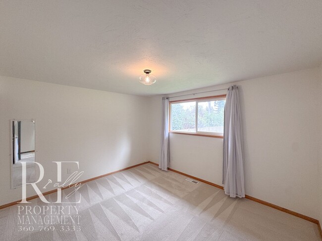 Building Photo - Bright & Spacious Single-Level Home with Dual Living Areas