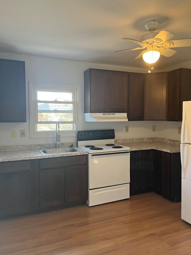 Building Photo - 7-MXW Holding Corp