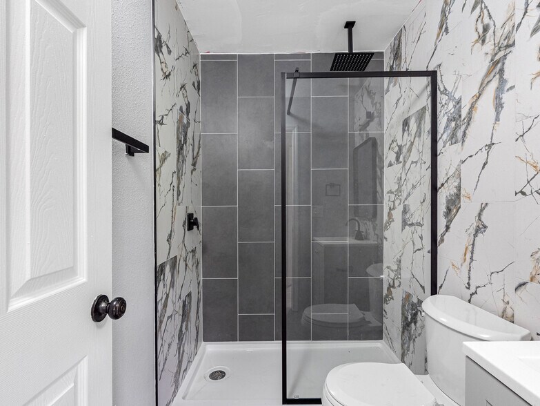 Recently renovated main bathroom with rain shower - 311 Avanda Ct
