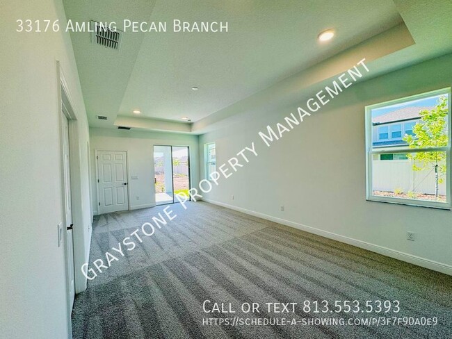 Building Photo - "Luxury Living in Wesley Chapel: Spacious ...