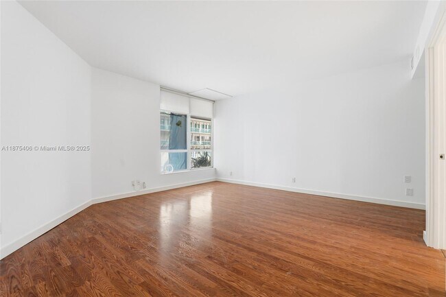 Building Photo - 10155 Collins Ave