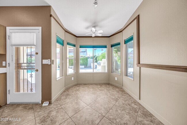 Building Photo - 5639 E Aire Libre Ave