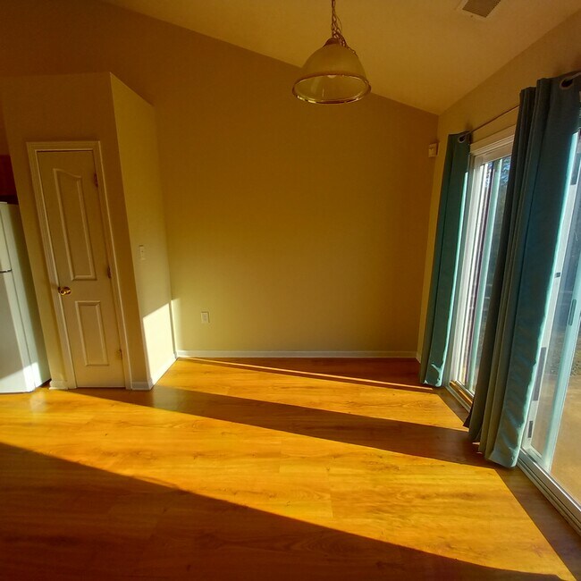 Dining area with slider to patio - 1031 Rocky Meadows Ln