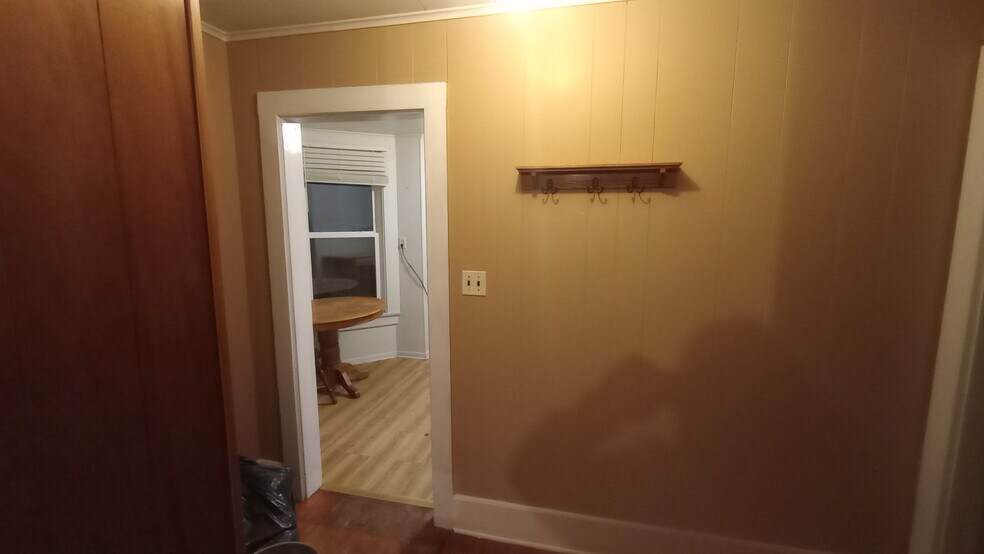 Top of stairwell entrance to kitchen - 203 W Main St