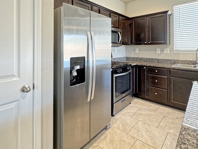 Building Photo - Only 4 years new!