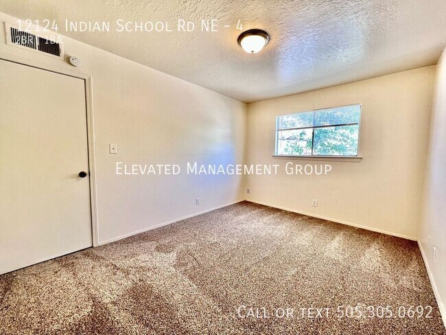 Building Photo - 12124 Indian School Rd NE