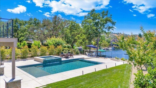 Building Photo - Luxury Lakefront Retreat with Pool, Hot Tub & Private Dock on Lake Tulloch - Recently Remodeled!