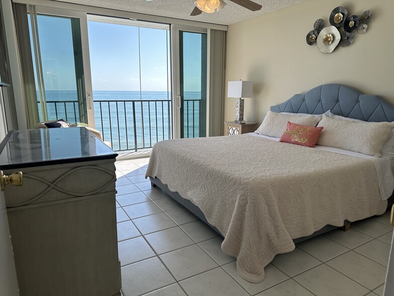 Brand new sliding glass doors in master bedroom - 9650 S Ocean Dr