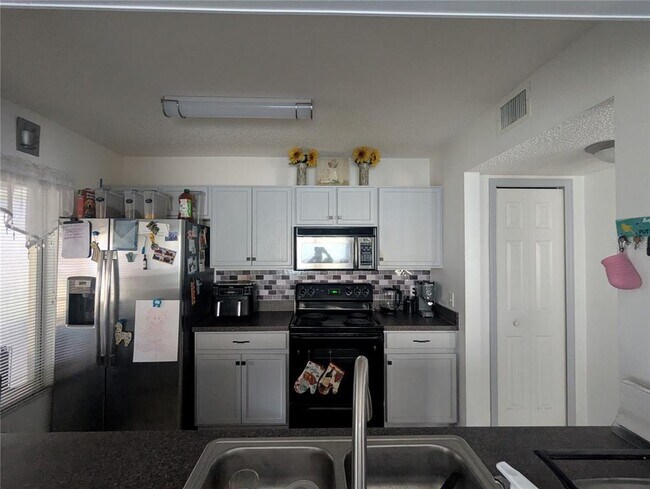 Building Photo - 10740 Keys Gate Dr