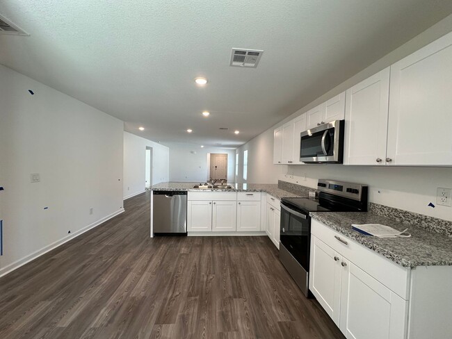 Building Photo - Move In Special! $300 Off Per Month for Fi...