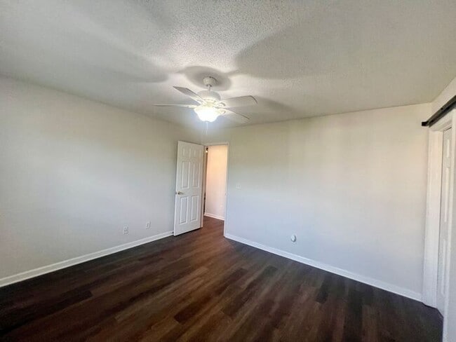 Building Photo - Freshly Painted! New Luxury Vinyl Plank Fl...