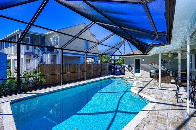 Building Photo - Waterfront Furnished Pool Home with Gulf & Canal Views in Estero Bay Shores