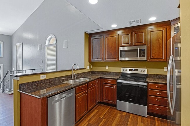 Building Photo - Modern Tri-Level Townhome in Copper Leaf C...