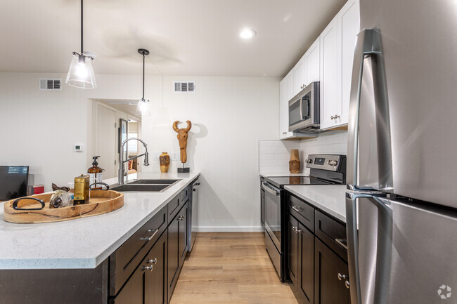 2BR, 1BA - 765SF - Kitchen - Nuvo Sunset