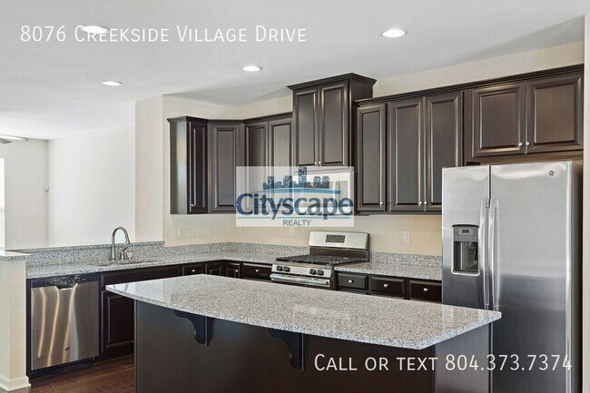 Building Photo - 8076 Creekside Village Dr