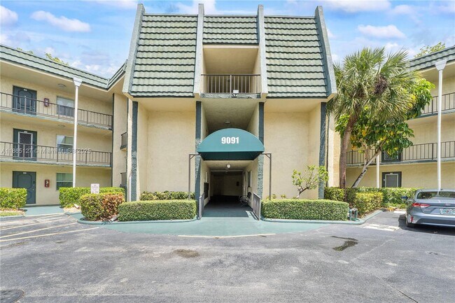 Building Photo - 9091 Lime Bay Blvd