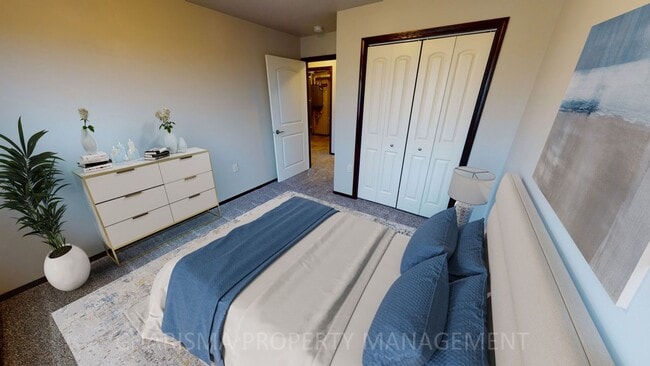 Building Photo - LOWER LEVEL 3 BEDROOM, 2 BATH TOWN HOME, INDIVIDUAL ENTRANCE, DOUBLE ATTACHED GARAGE, PET FRIENDLY