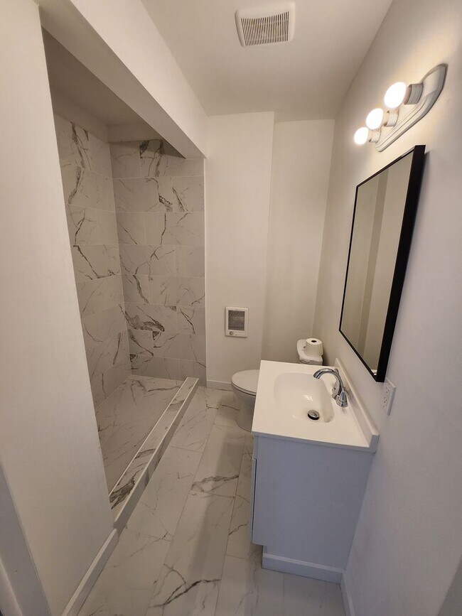 Building Photo - Row Home For Rent with Fenced in BackYard