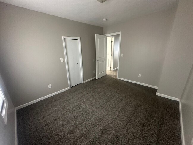 Building Photo - Spacious 4-Bedroom Home Near Northtown Mall