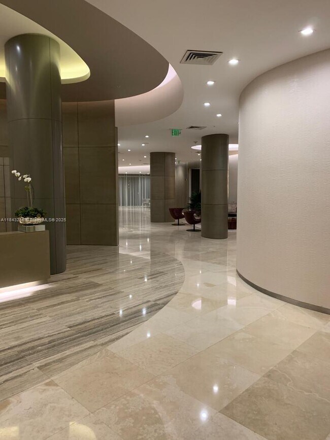 Building Photo - 10275 Collins Ave