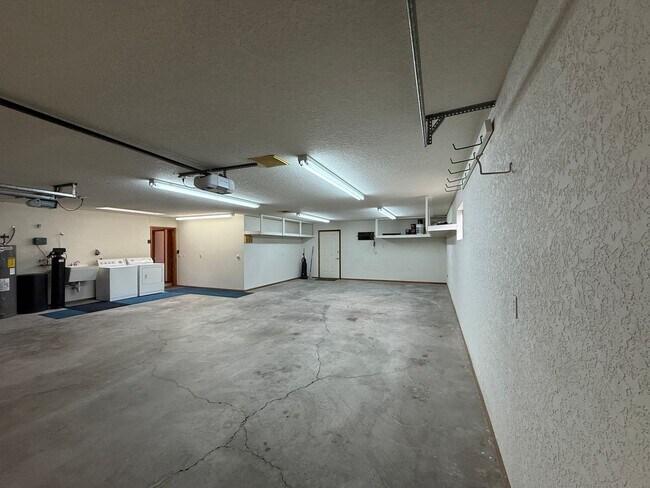 Building Photo - Available now - Unfurnished - Long Term