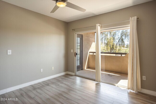 Building Photo - 9451 E Becker Ln