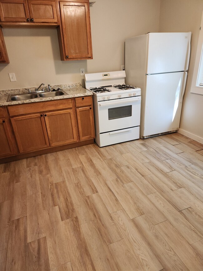Kitchen with Stove and refrigerator - 31847 Bay Ct
