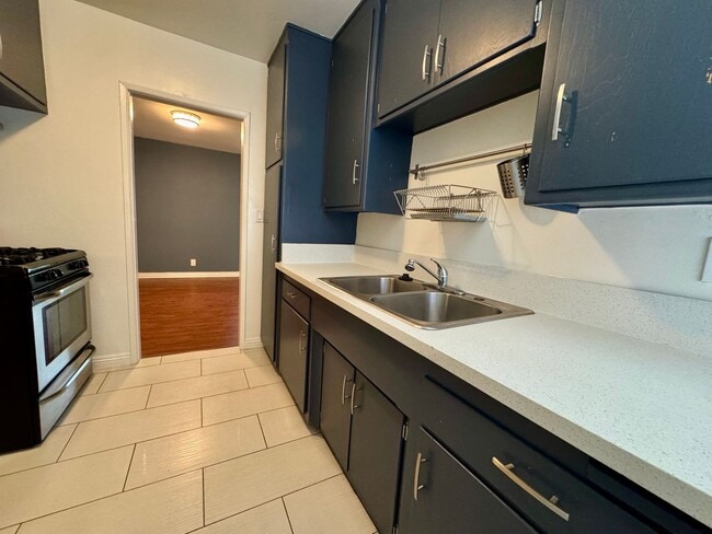 Building Photo - Updated Lower apartment with Hardwood Floo...