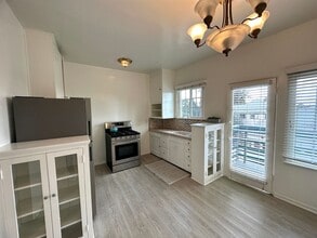 Building Photo - Vintage Style 1+1 - New Kitchen Appliances, Plank Floors, Balcony, pet friendly