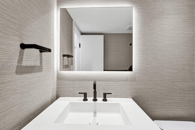 Building Photo - 5555 Collins Ave