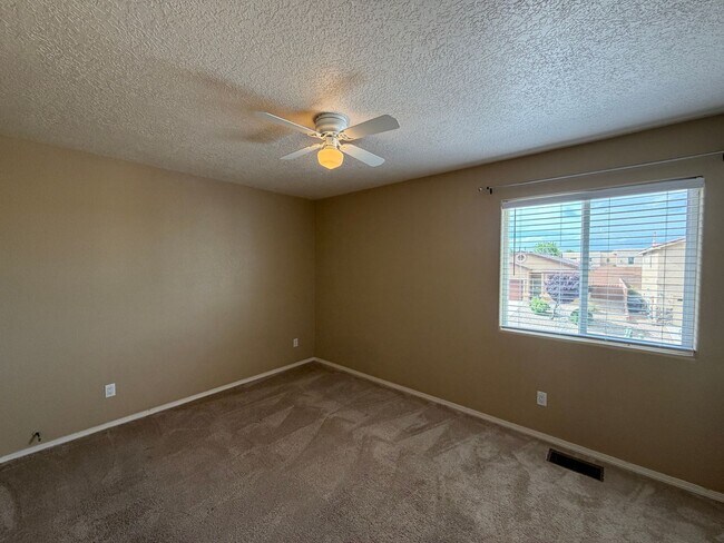 Building Photo - 4 Bedroom Home Available Near McMahon Blvd NW & Universe Blvd NW!