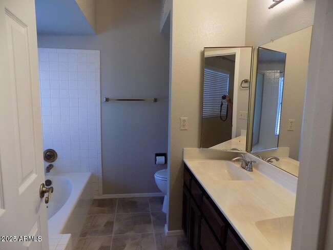 Building Photo - 9081 E Aster Dr