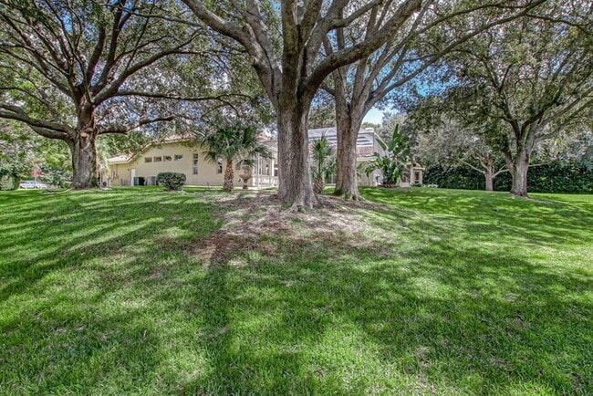 Building Photo - Stunning 5-Bedroom Pool Home on Nearly 2 A...