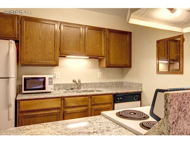 Building Photo - Inviting 2-Bedroom Condo Near Shopping & Dining | Available Early July